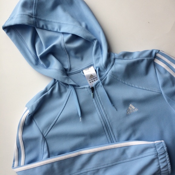 blue adidas jacket with white stripes